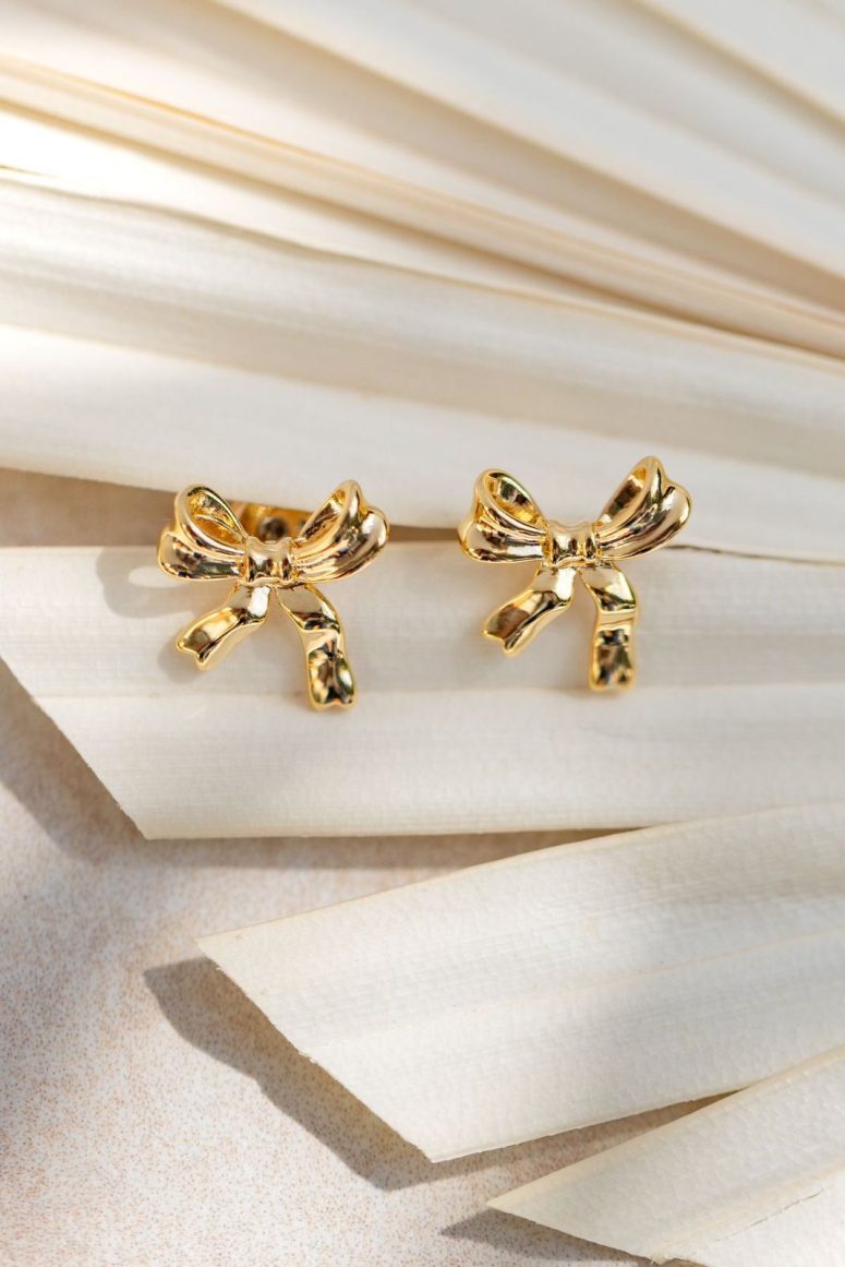 gold bow-shaped earrings